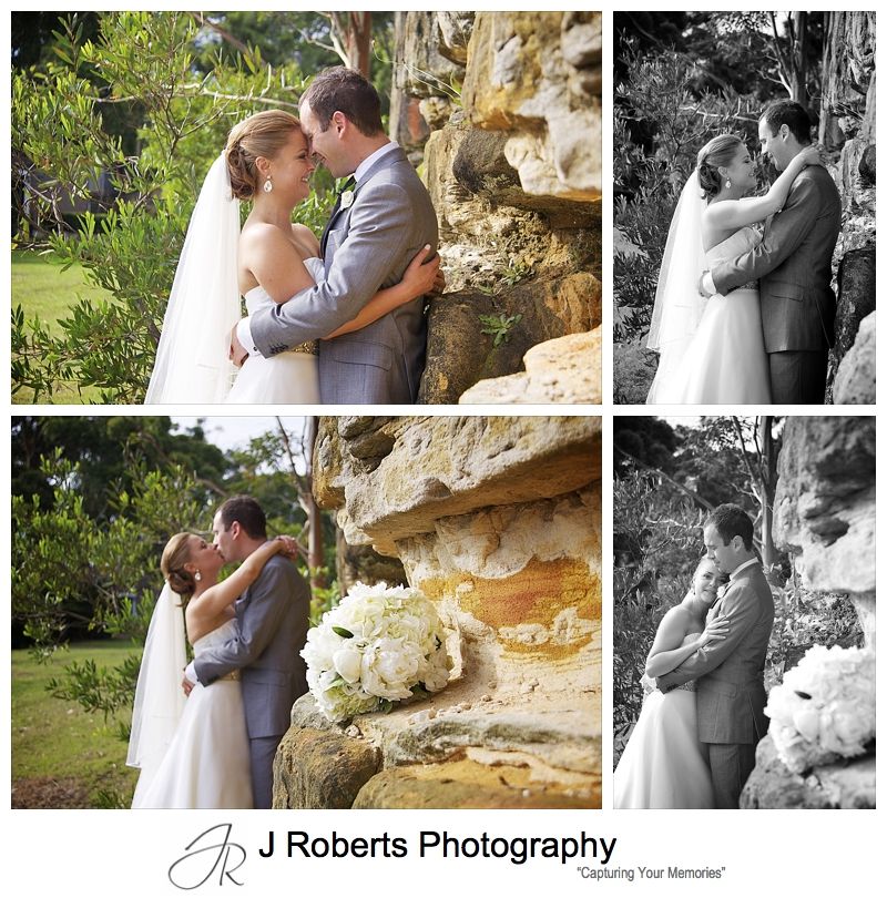 Couple embracing near sandstone wall - wedding photography sydney